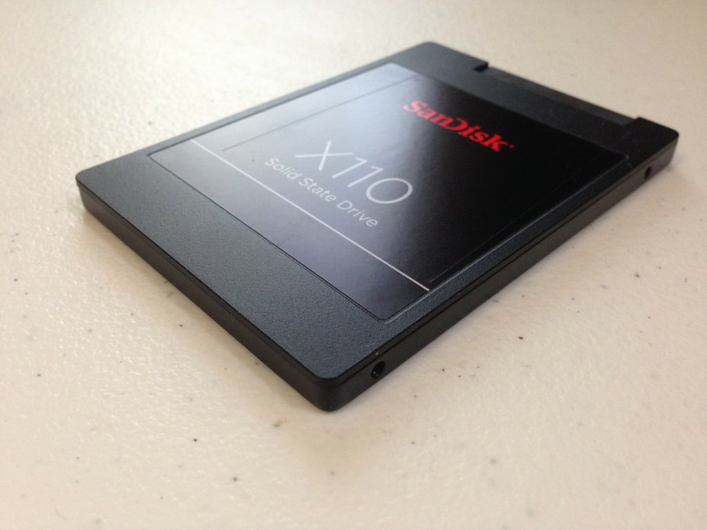 sandisk x110 ssd: sleek black design, compact form factor, and modern aesthetic on display.