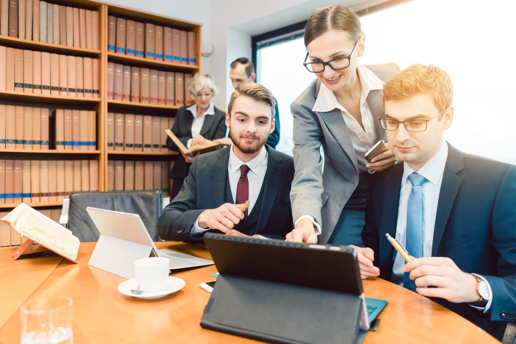 legal team collaboration in modern conference room with technology and professional facilitation.