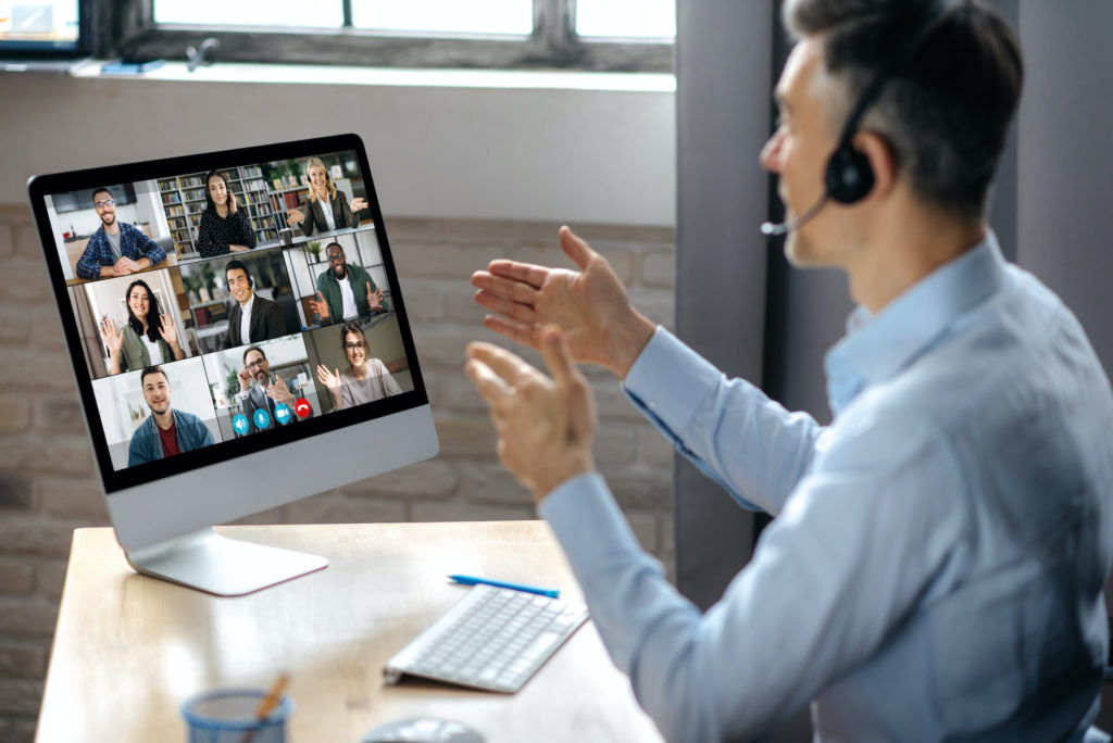 virtual multiracial business collaboration through modern online negotiations.