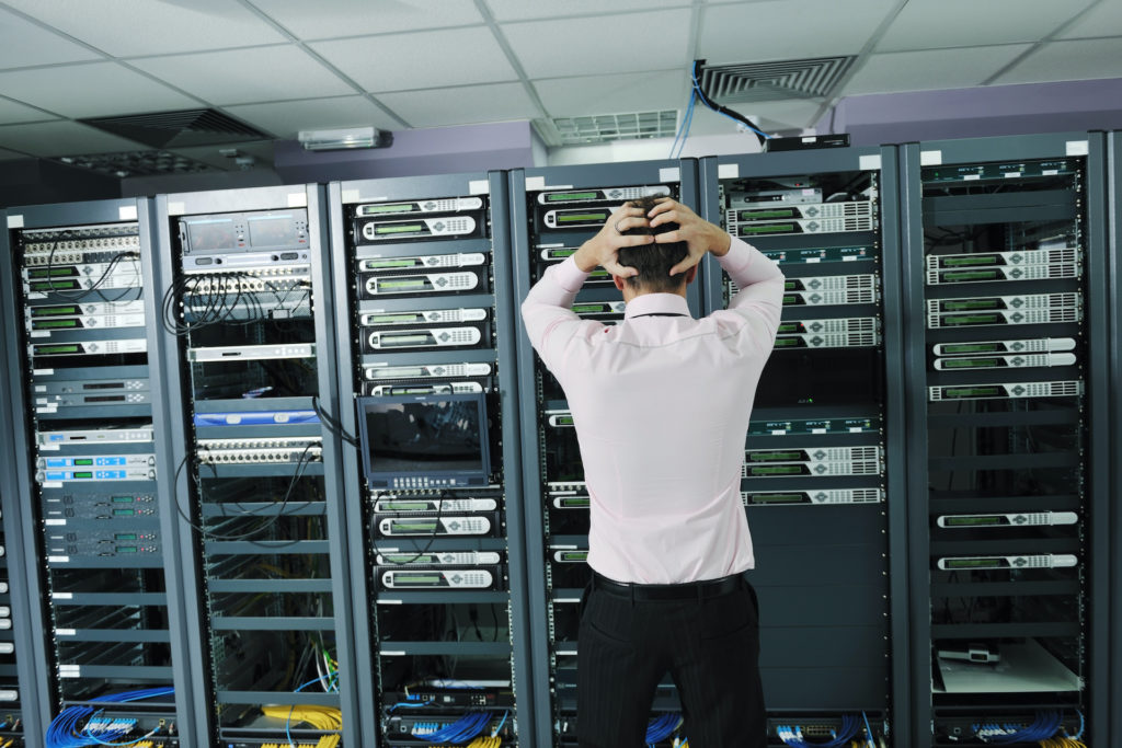 stressful it crisis in server room: urgent troubleshooting for internet services.