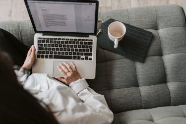 tranquil workspace with laptop and drink for remote work or studying.